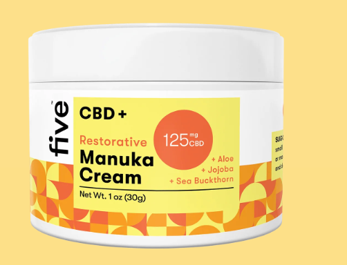 Container of five CBD+ Restorative Manuka Cream, 1 oz (30g), with Aloe, Jojoba, and Sea Buckthorn, label text visible