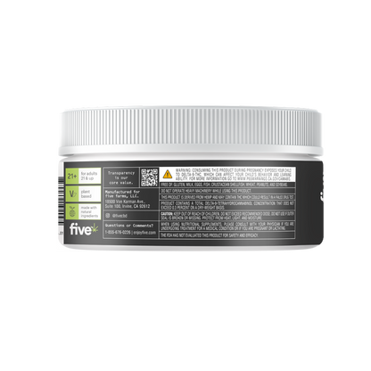 Rear view of Five Sativa Surge 10 mg THC gummies jar showing 21+ and plant-based icons with warning text